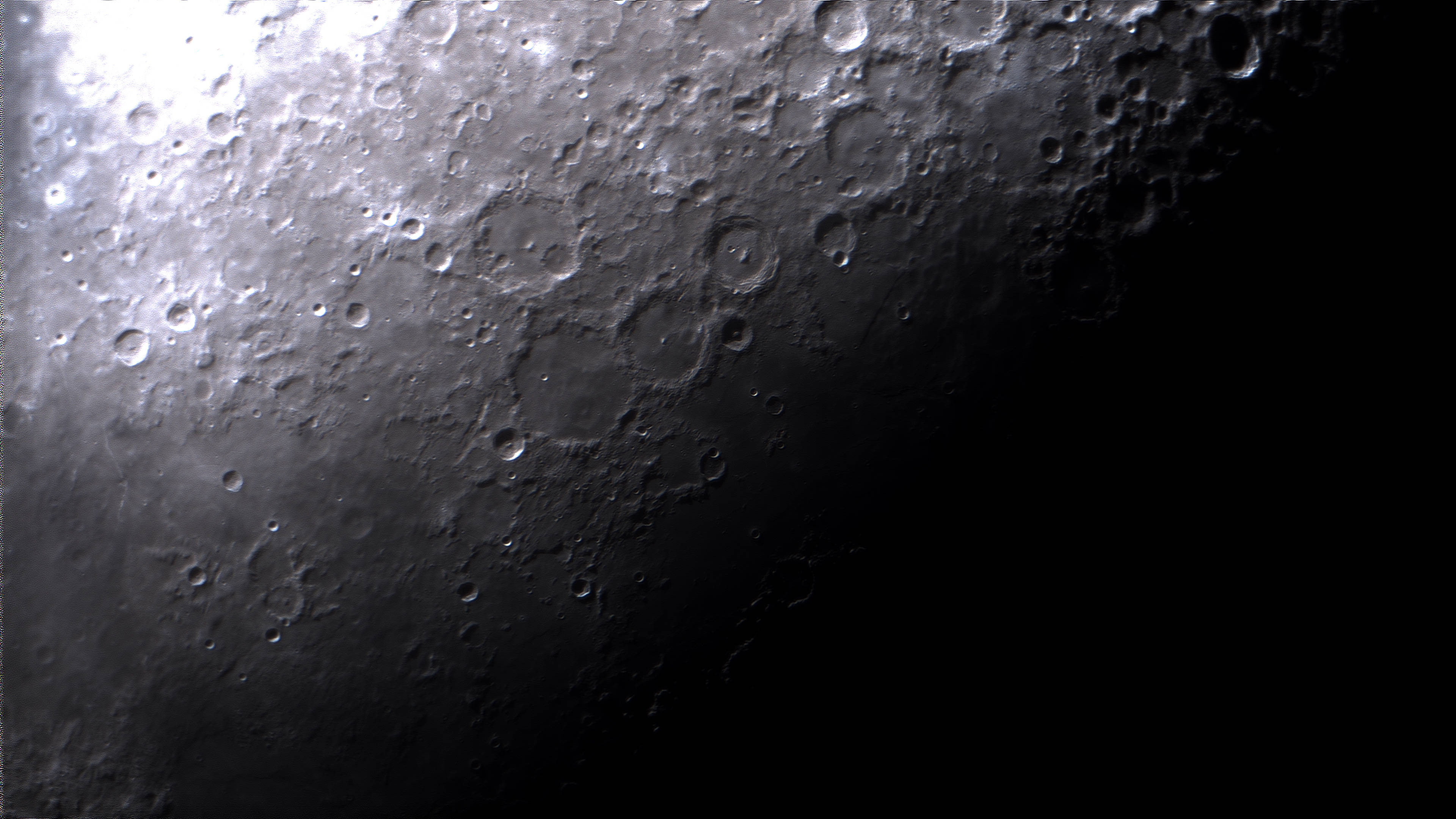 Ptolemaeus-Alphonsus_Arzachel2023-12-21-0351_3-MoonLivestackSurfacedowngrade.jpg